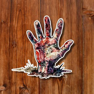 Colorful, eerie sticker of a blood-splattered hand rising from a puddle on a warm wooden plank background, creating a dramatic horror mood.