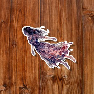 Whimsical purple watercolor ghost woman sticker with flowing dress, centered on a warm rustic wooden background.