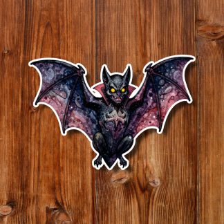 Gothic bat sticker with wide purple, starry wings, glowing yellow eyes, and a fierce expression against warm wooden planks.