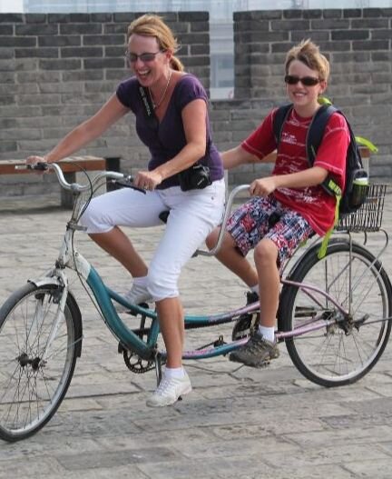 Allison &amp; son, Gavin, biking on Xi’an’s City Wall after the Beijing Book Fair 2011.