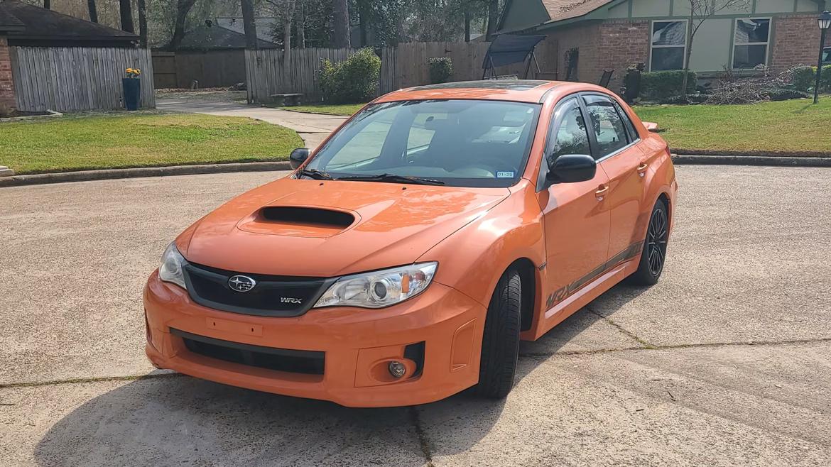 Is this rare Tangerine Orange Impreza WRX ripe for the picking?