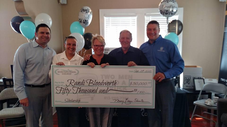 Woman holding check