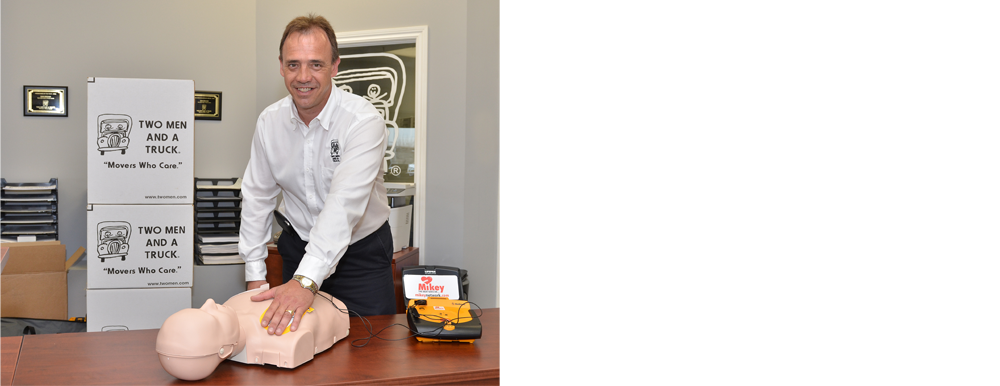 Dan Brohm demonstrates a MIKEY defibrillator for Mikey on Board