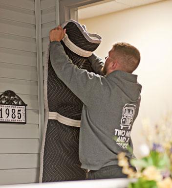 mover-protecting-a-door-jamb-with-protective-padding.jpg Thumbnail
