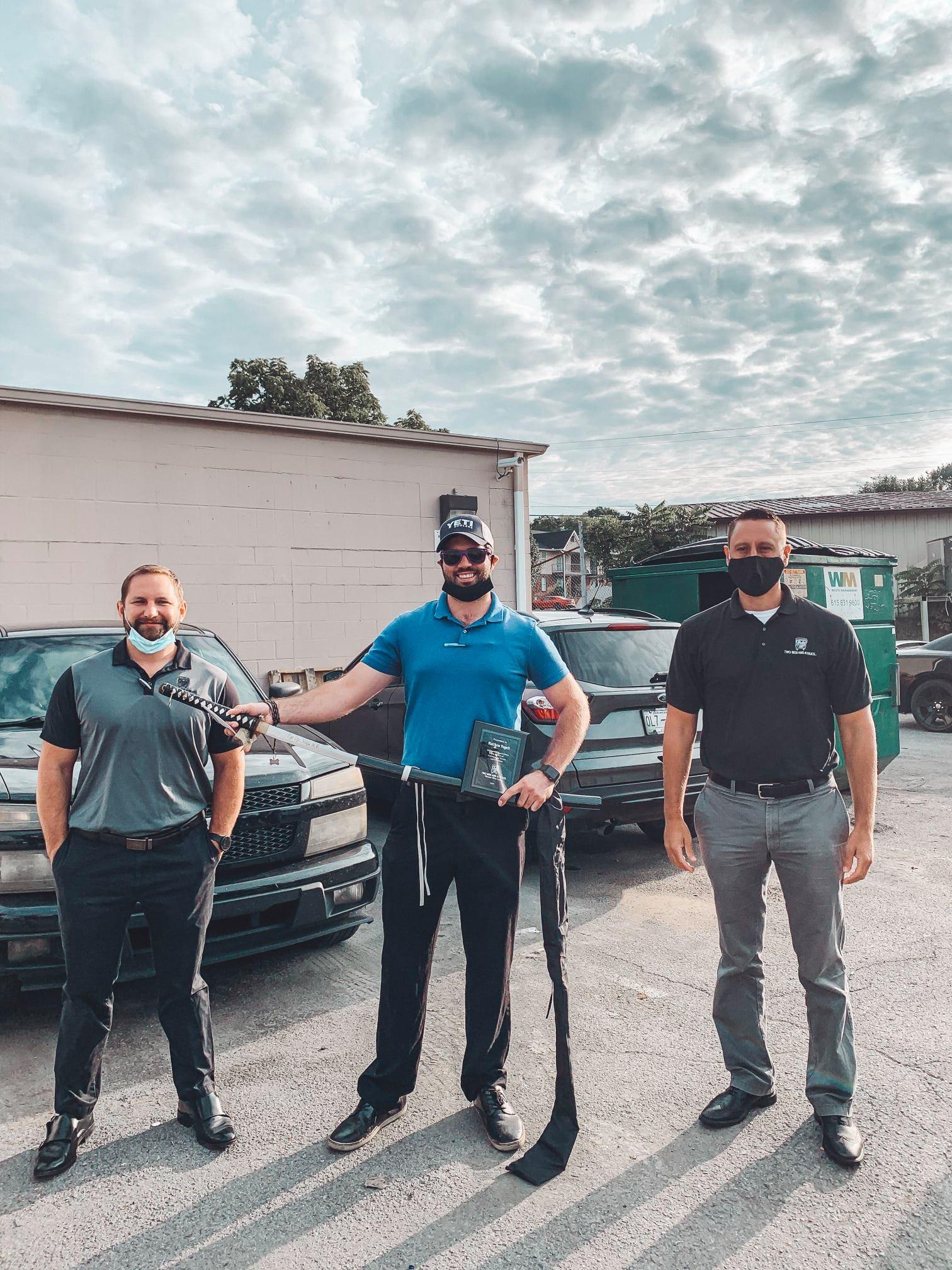 Matthew, alongside franchisees Nick and Gordon.