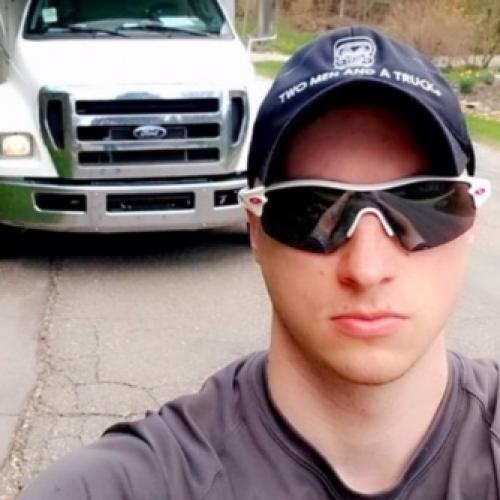 Man in front of a truck