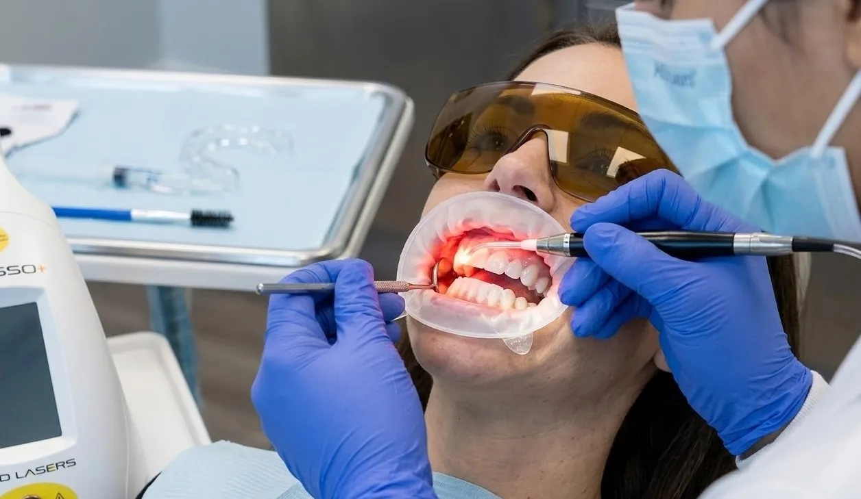 dental-professional-preparing-amd-dental-laser-device..webp