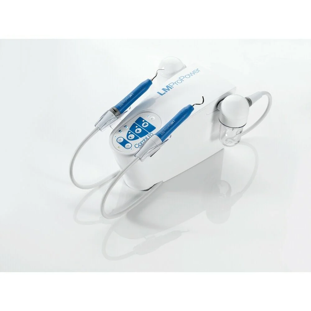 lm-dental-ultrasonic-scaler-tip-operating-in-a-transparent-water-container.webp
