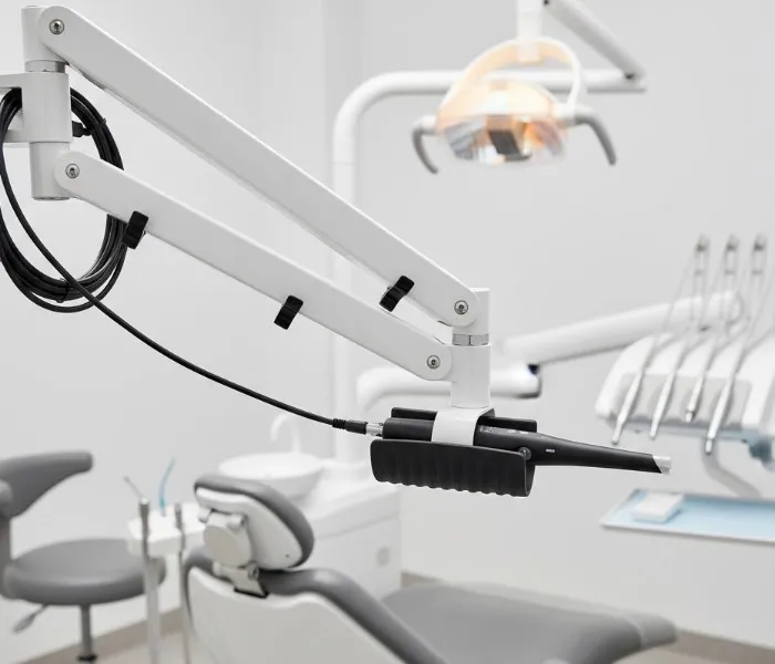 overhead-articulated-arm-mount-holding-a-dexis-intraoral-camera-with-anti-slip-grip-and-secured-positioning-during-patient-examination..webp