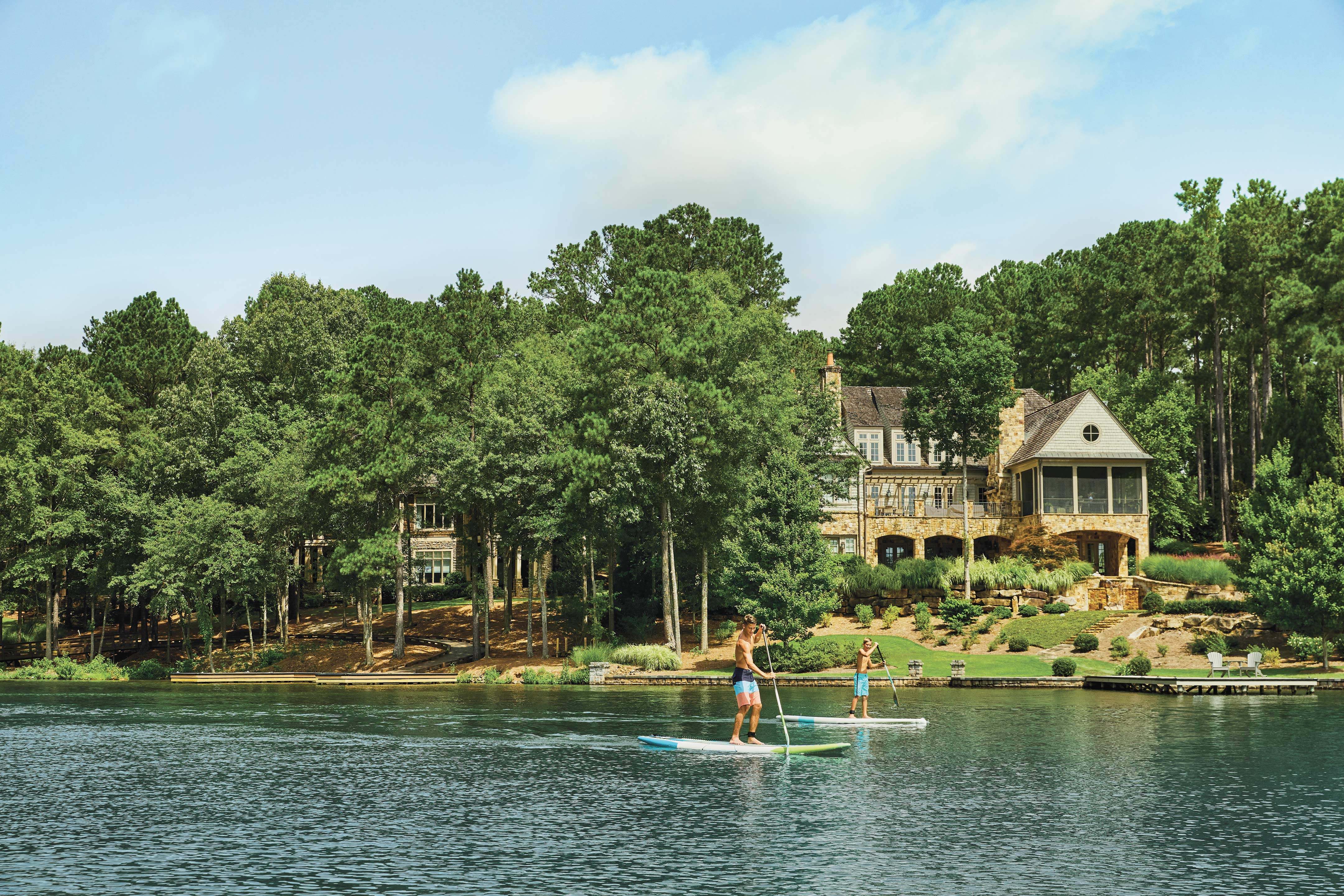 Boys Paddleboarding Distant Resized