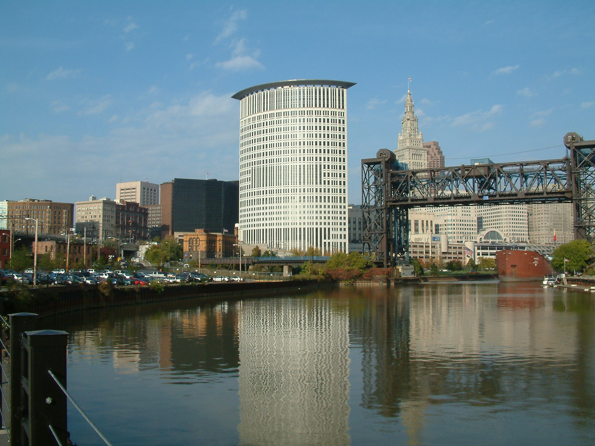 The federal courts tower rises behind the Cuyahoga River
