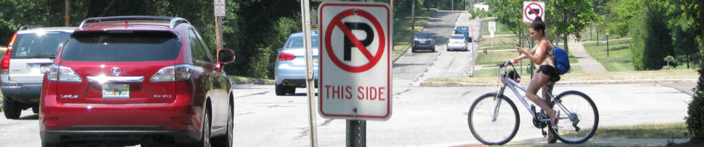 cars and sign and bike