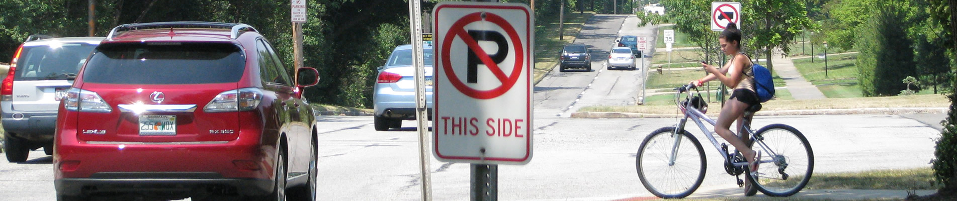 cars and sign and bike