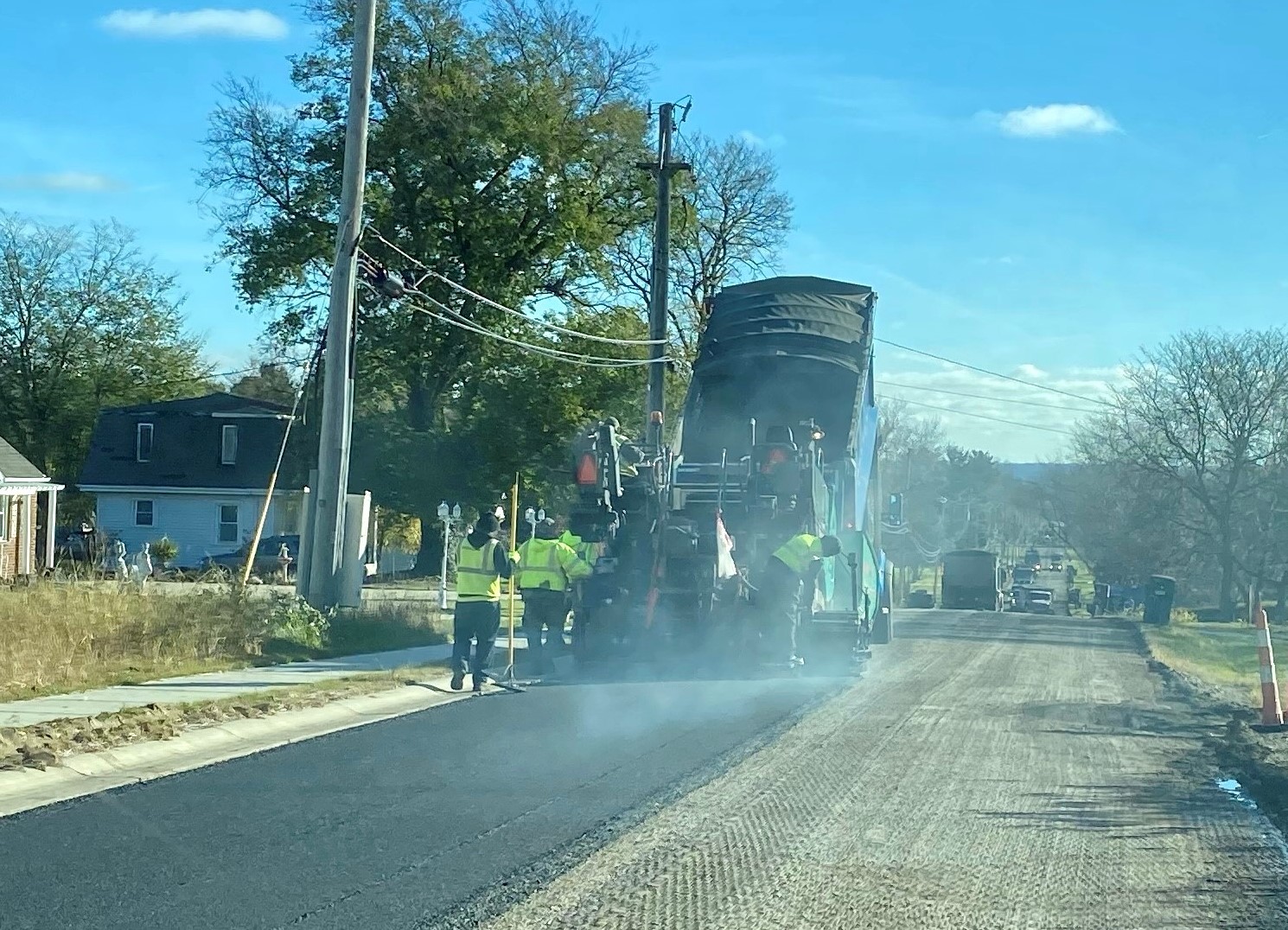 workers repaving a street