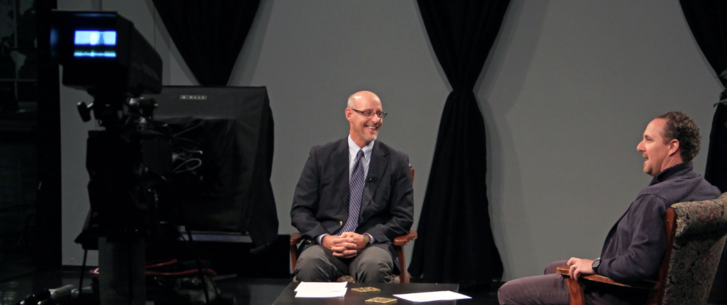 Superintendent John Trunk being interviewed on TV
