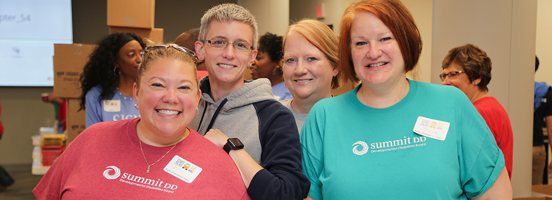 Summit DD staff volunteering at the United Way. Volunteer.