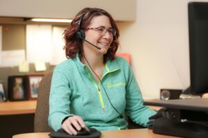 Smiling woman providing customer service
