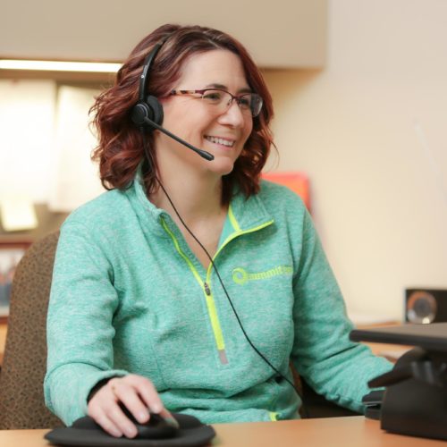 Smiling woman providing customer service