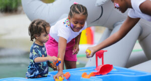 Kids enjoying Summit DD's Party on the Block