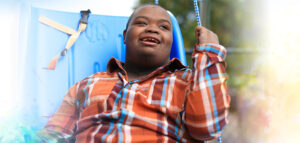 Travis on a swing at his Total Education Solutions School.