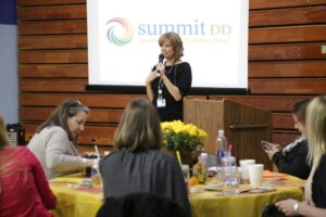 Summit DD staff member presenting to a group