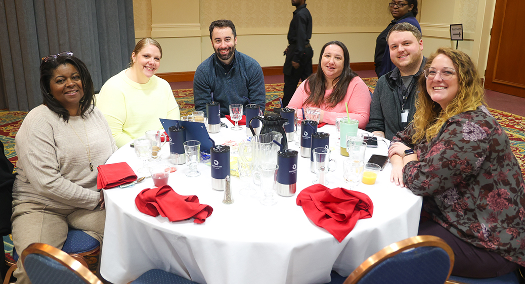 Staff celebrating at the 2024 Employee Recognition Breakfast.