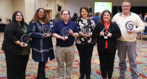 Staff celebrating at the 2024 Employee Recognition Breakfast.