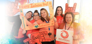 Group of Summit DD Staff celebrating Inclusion Day.
