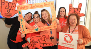 Group of Summit DD Staff celebrating Inclusion Day.
