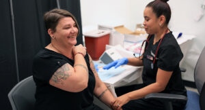 Summit DD staff receiving vaccine.