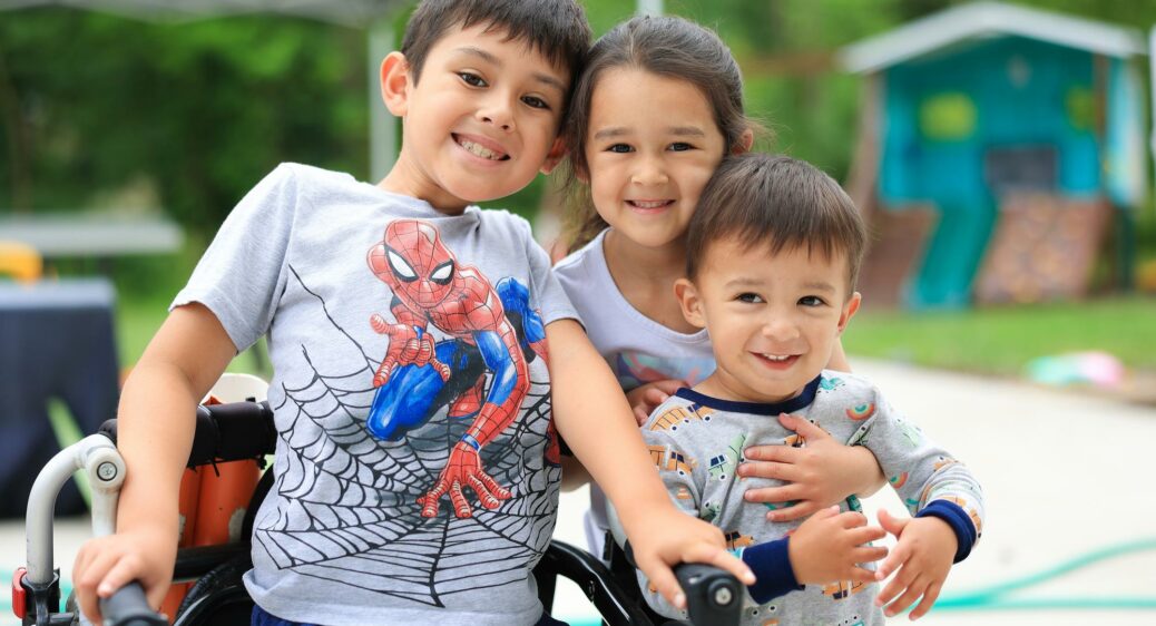 Austin Cruz at him home with his siblings.