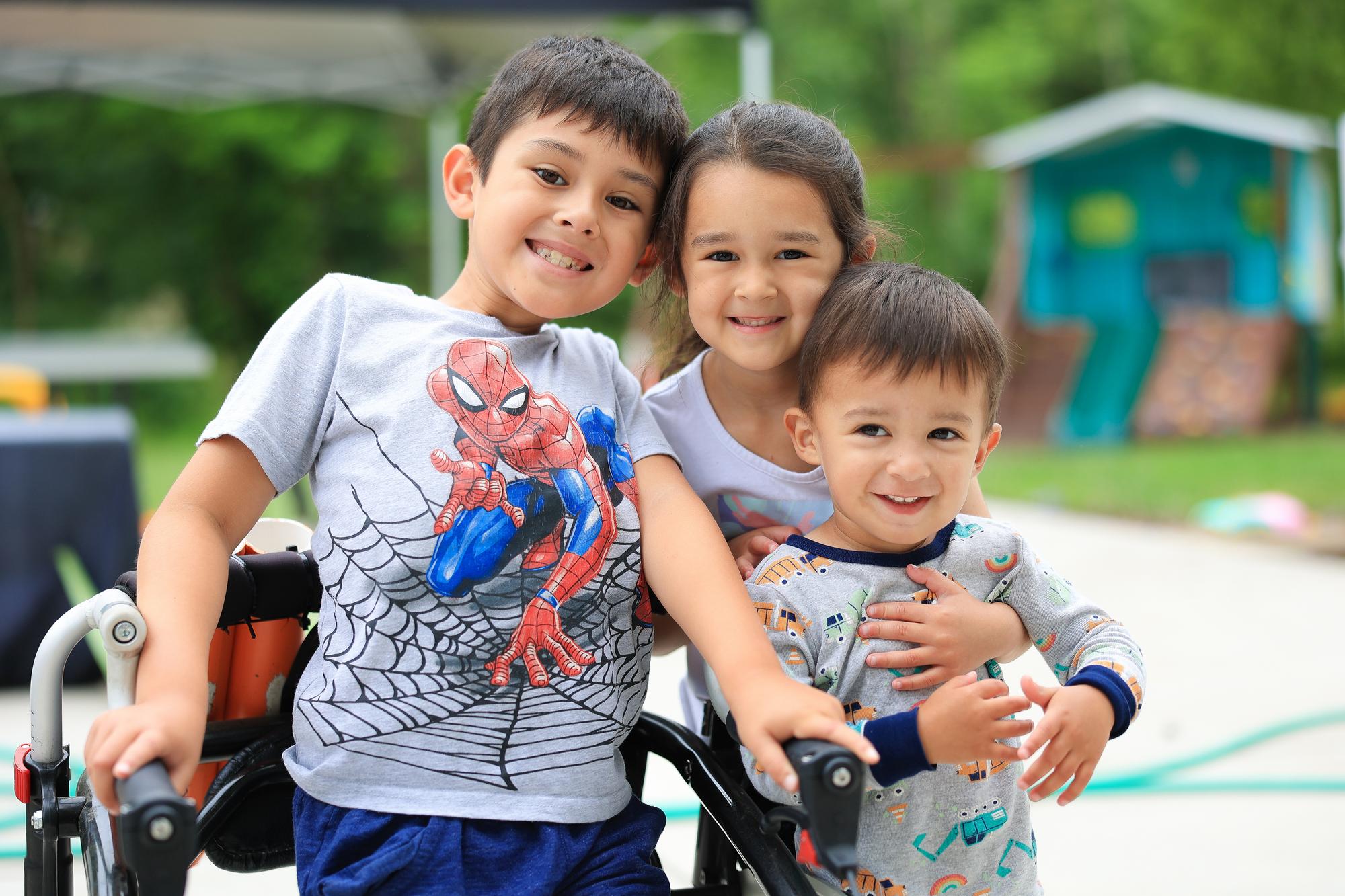 Austin Cruz at him home with his siblings.