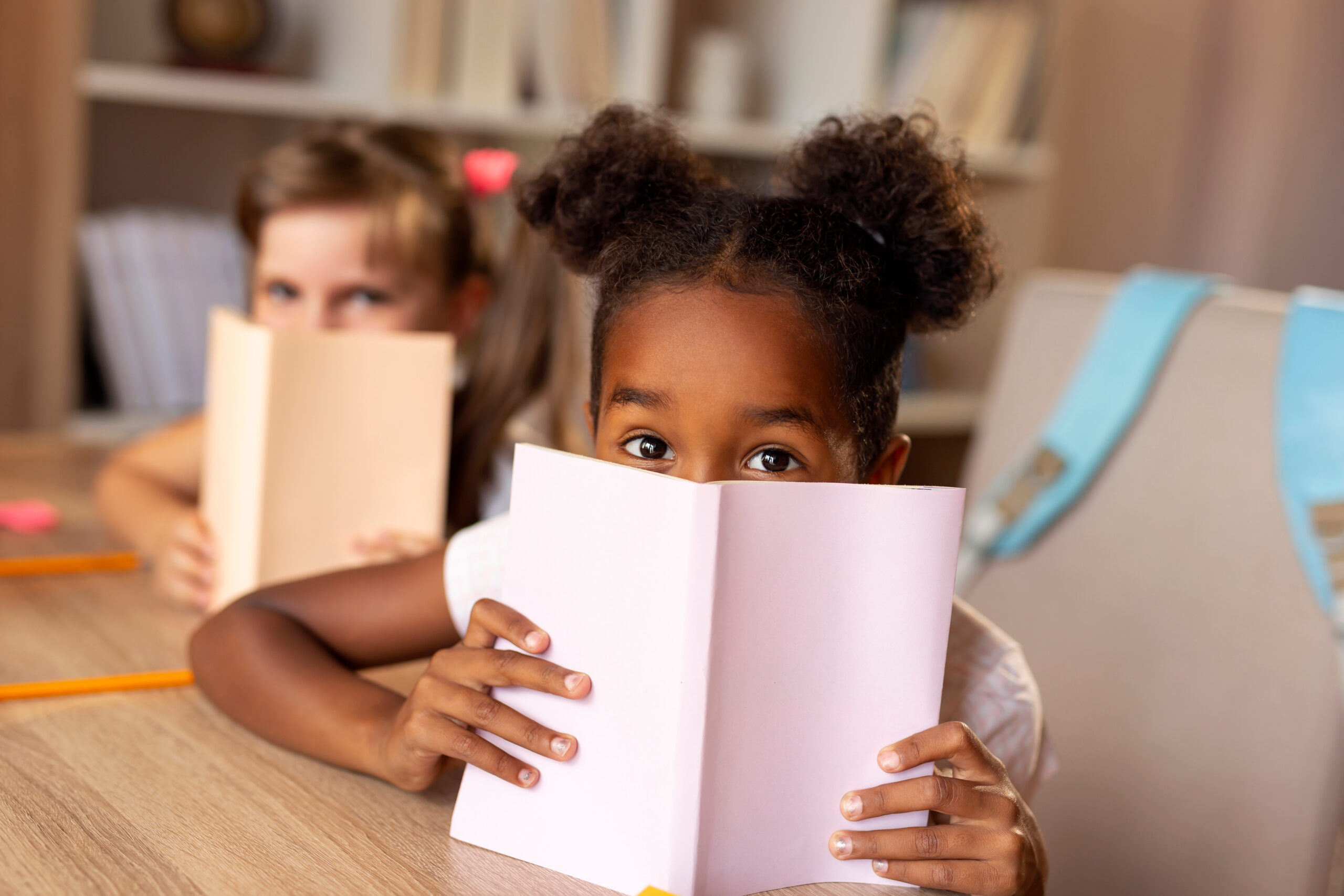 Schoolgirls reading books