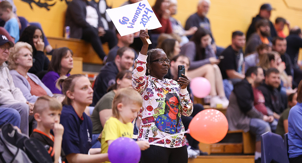 Special Olympics athletes playing a basketball game against Summit DD staff.