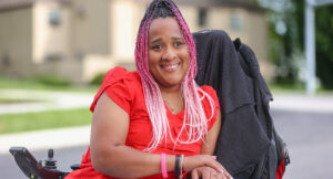 Marci, emerging leader program graduate, posing for a photo outdoors.