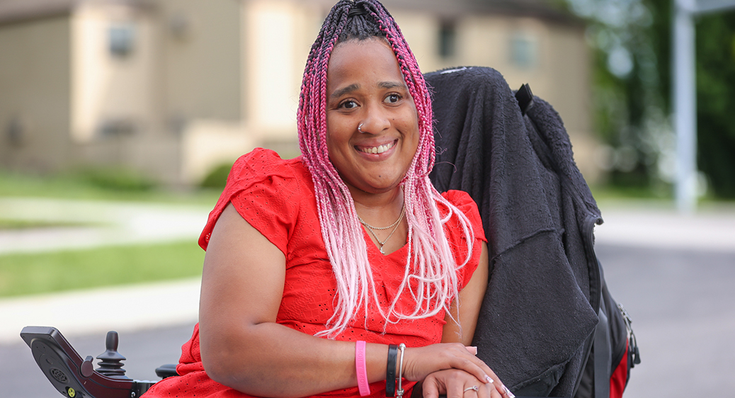 Marci, emerging leader program graduate, posing for a photo outdoors.