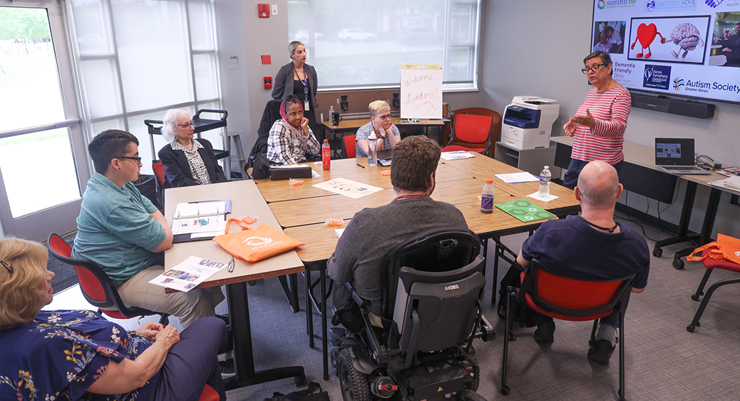 Emerging leader participants working together at a large table.
