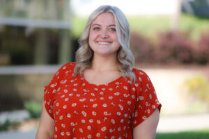 Portrait of new staff person Sydney Pratt.