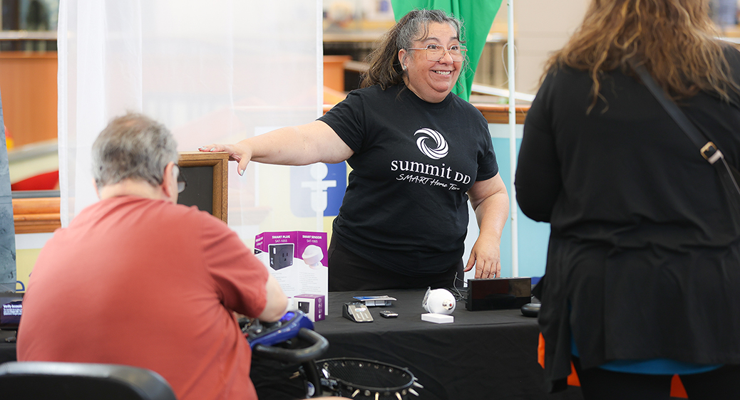 An individual exploring tech options at the tech expo.