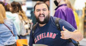 An individual exploring tech options at the tech expo.