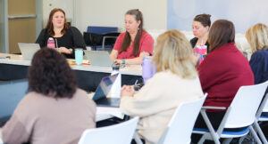 A member of the Intensive Treatment Team speaking during a team meeting.