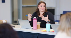 A member of the Intensive Treatment Team speaking during a team meeting.