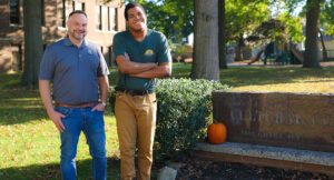 Maliek and Assistant Superintendent of Cuyahoga Falls parks and recreation, Michael Fallis, posing proudly for a photo at a Cuyahoga Falls parks and recreation location.