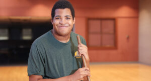 Maliek posing proudly for a photo at a Cuyahoga Falls parks and recreation location.