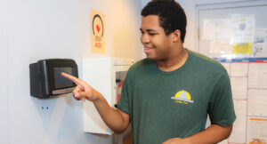 Maliek posing proudly for a photo at a Cuyahoga Falls parks and recreation location.