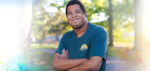 Maliek posing proudly for a photo at a Cuyahoga Falls parks and recreation location.