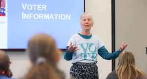 League of Women Voters volunteer Leah Holden presenting information on Rights of Voters with Disabilities