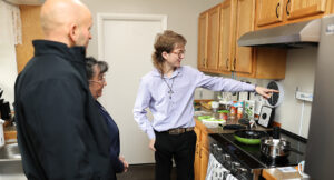 Photo of Evan providing a tour of the Summit DD Smart Home.