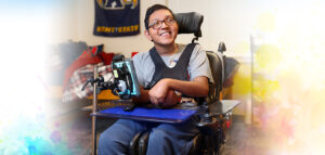 Image of young man named Sam in his dorm at Kent State.