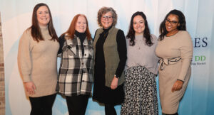 A group of Summit DD team members posing for a photo.